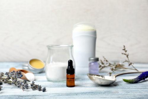 Natural ingredients for deodorant on wooden table