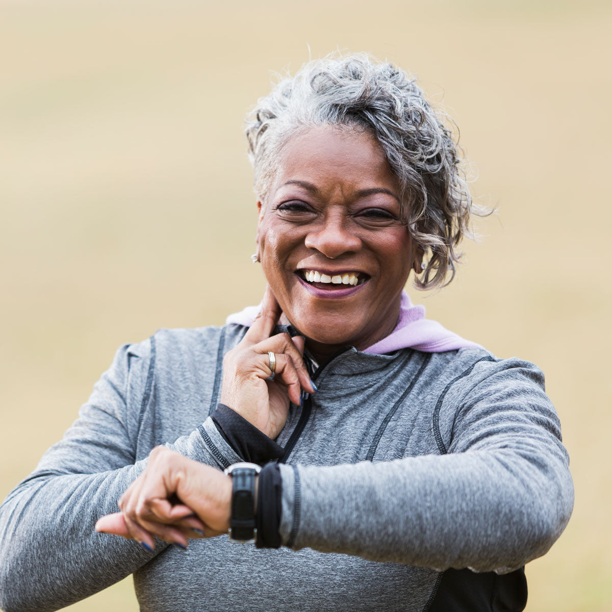 Woman checking her heart beat while exercising