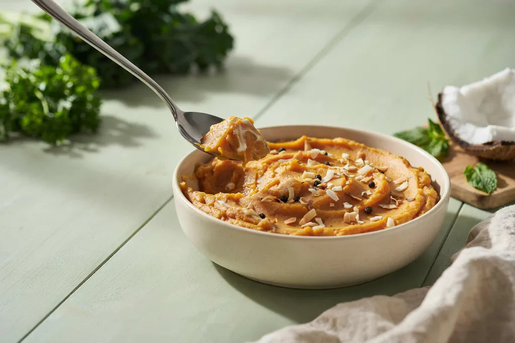Sweet Potatoes with a Coconut Twist - a casserole of bright orange mashed sweet potato