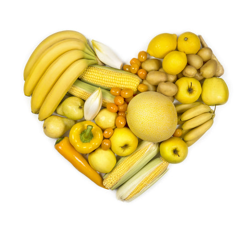 Heart of yellow fruits and vegetables