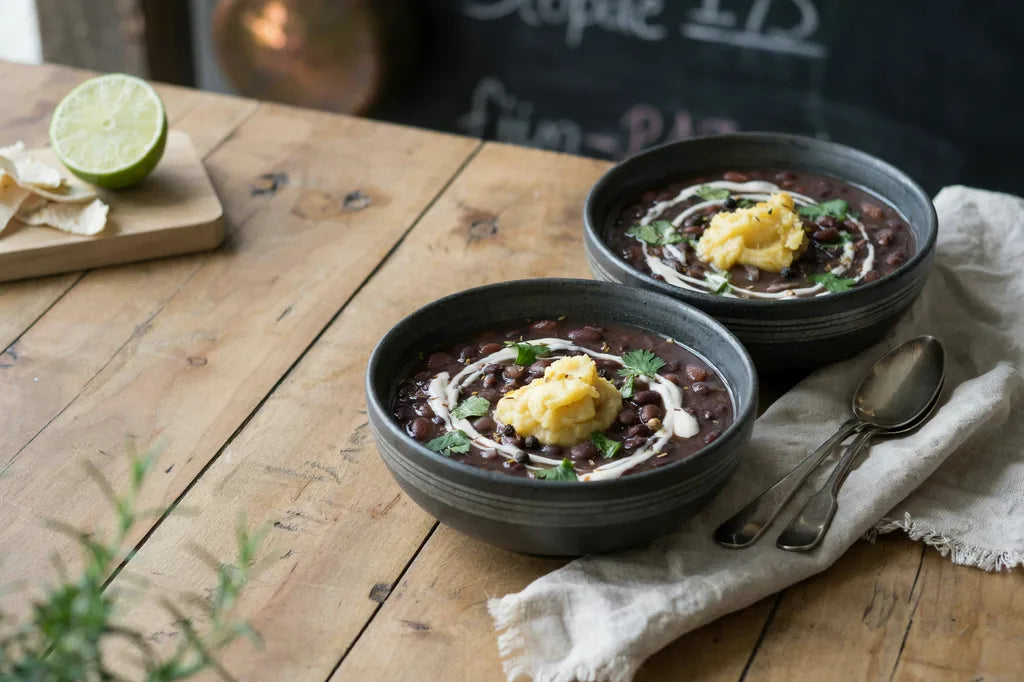 Black Bean Soup - a rustic bowl of black bean soup topped with cashew cream