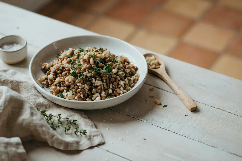 Lentils and Whole Grain Rice - a white bowl of lentil and rice pilaf