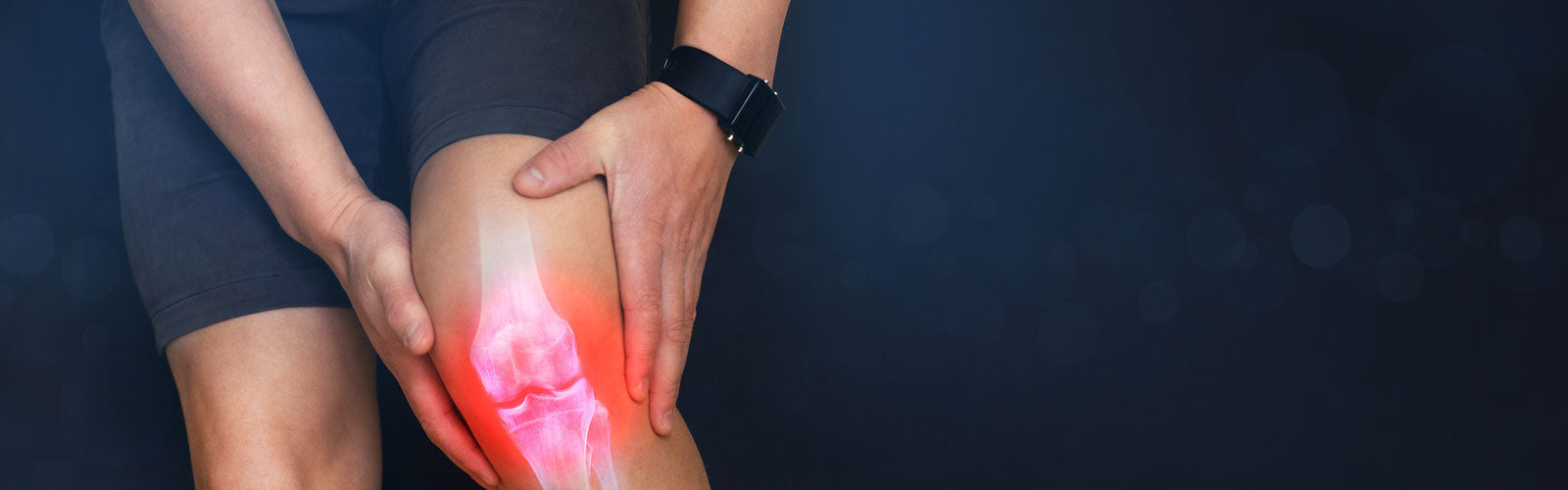Man feeling joint pain in his knee