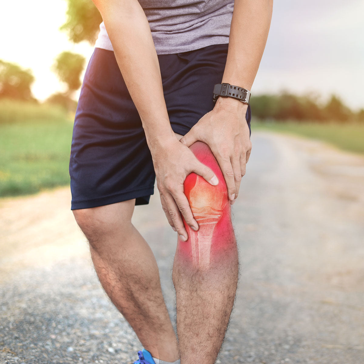 Man expressing joint pain in his knees